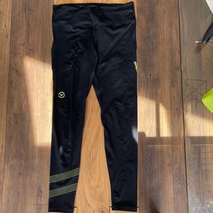 Virus compression pants. Black with neon green writing. Size Small.